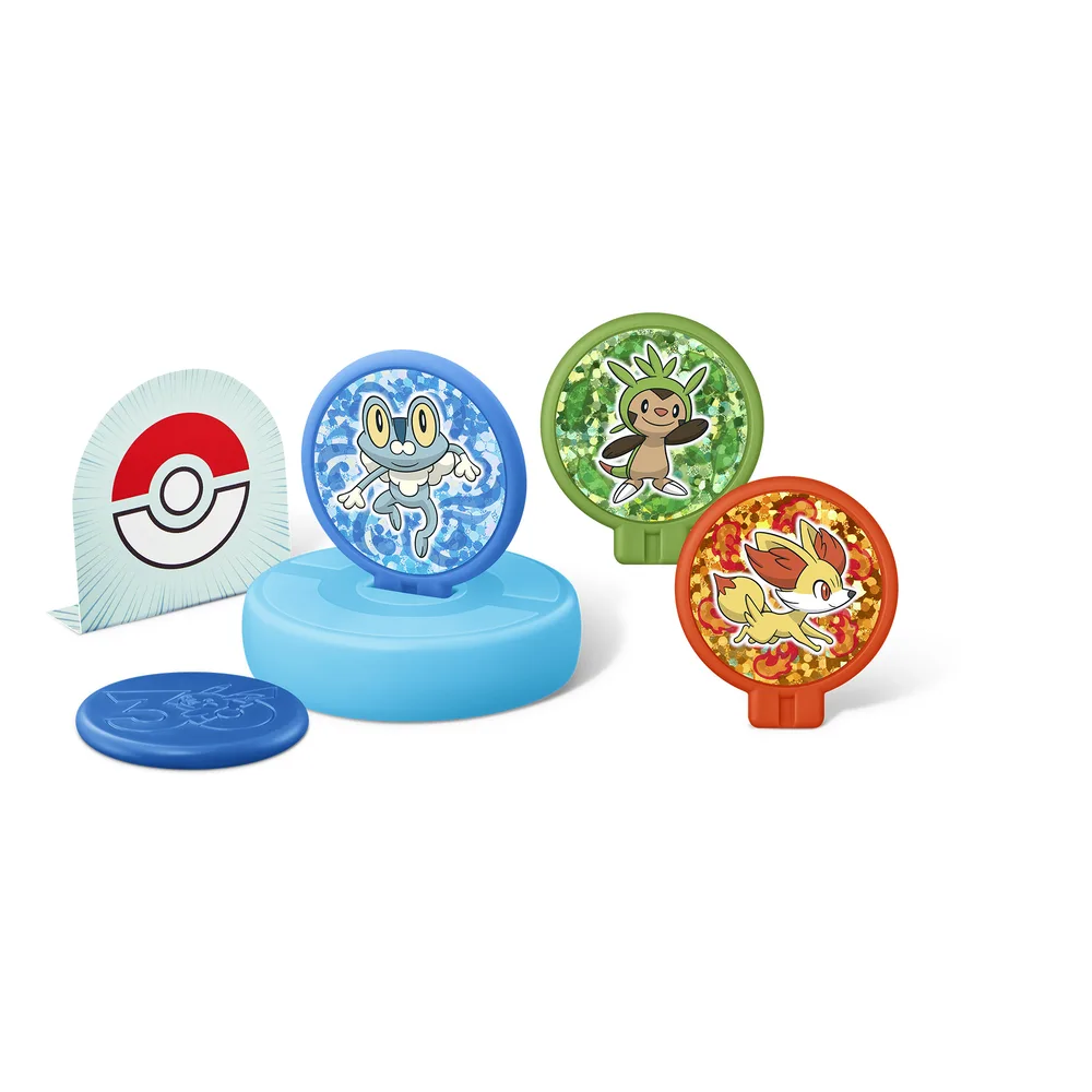 Target Hockey toy with a blue base, a Poké Ball target and holographic panels of Froakie, Chespin and Fennekin