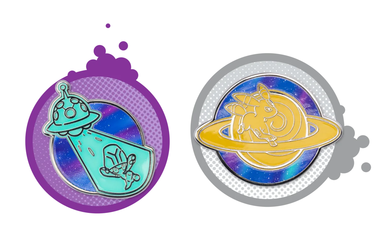 Glow-in-the-dark enamel pins featuring Elgyem in a UFO beam and Umbreon inside Saturn's rings